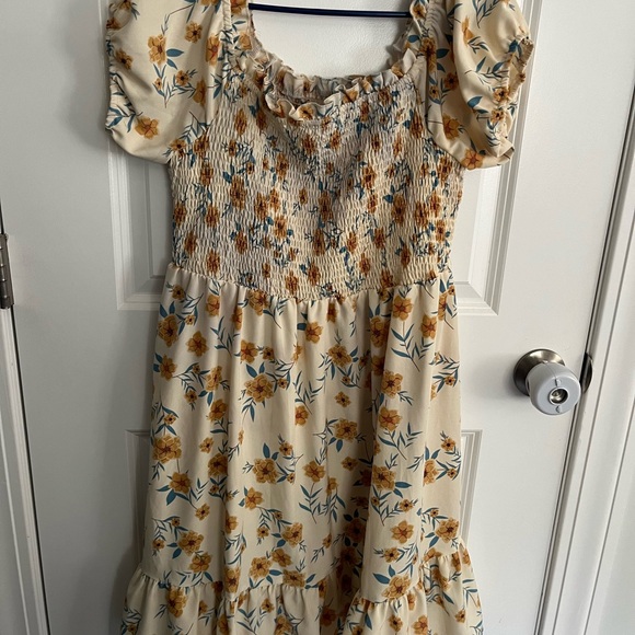 Dresses & Skirts - Ivory sun dress with blue yellow flowers